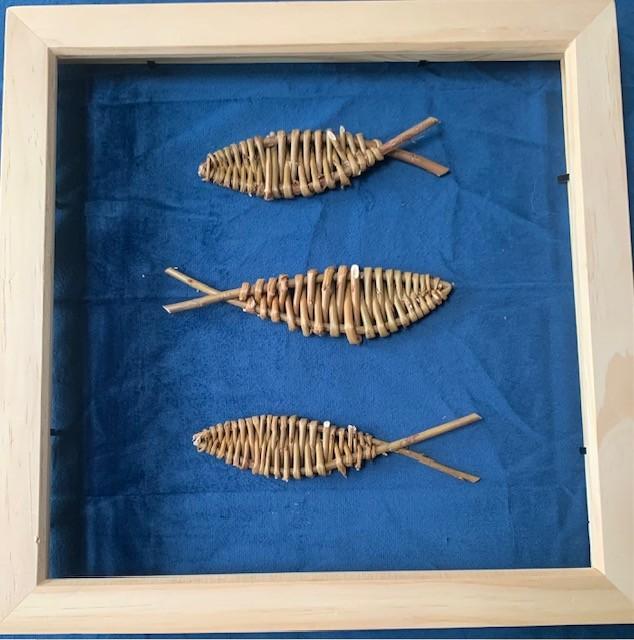 Wicker fish in frame