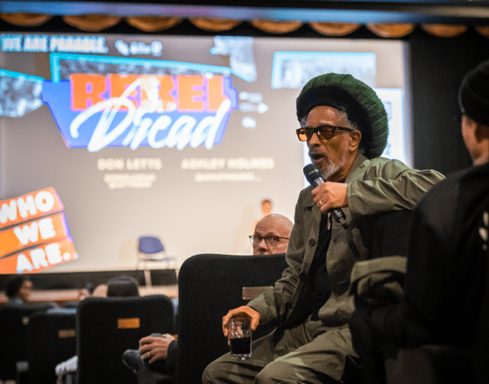 Don Letts amongst the audience in Screen 1 holding a microphone